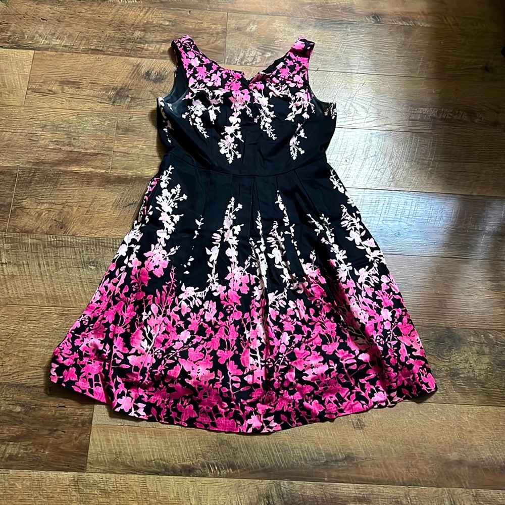 A knee length, floral patterned dress